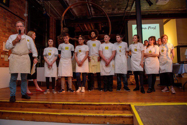 Barney Houghton on stage with the young chefs at Bristol 24/7 Autumn Feast