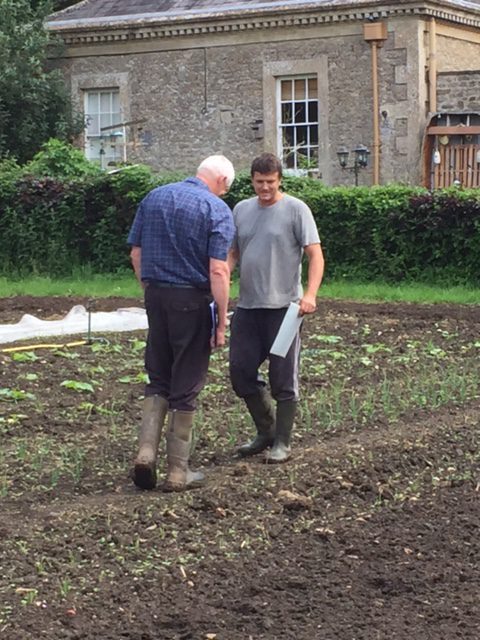 Soil Association inspector, Paul Farmer (left), walks the garden with our grower, Matt