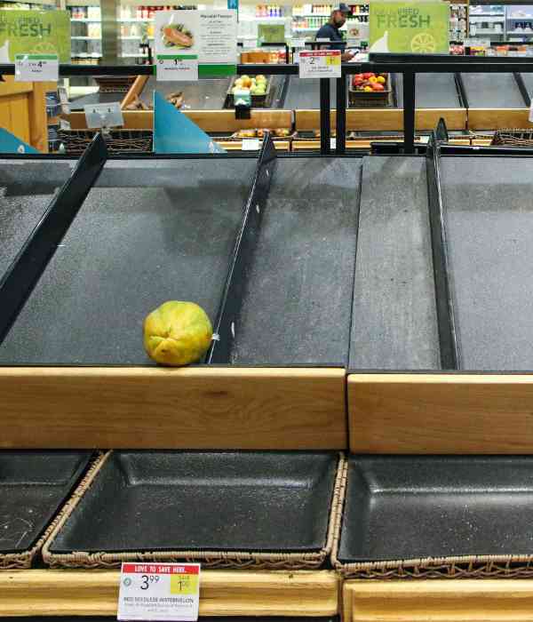 Empty supermarket shelves vegetables and fruit
